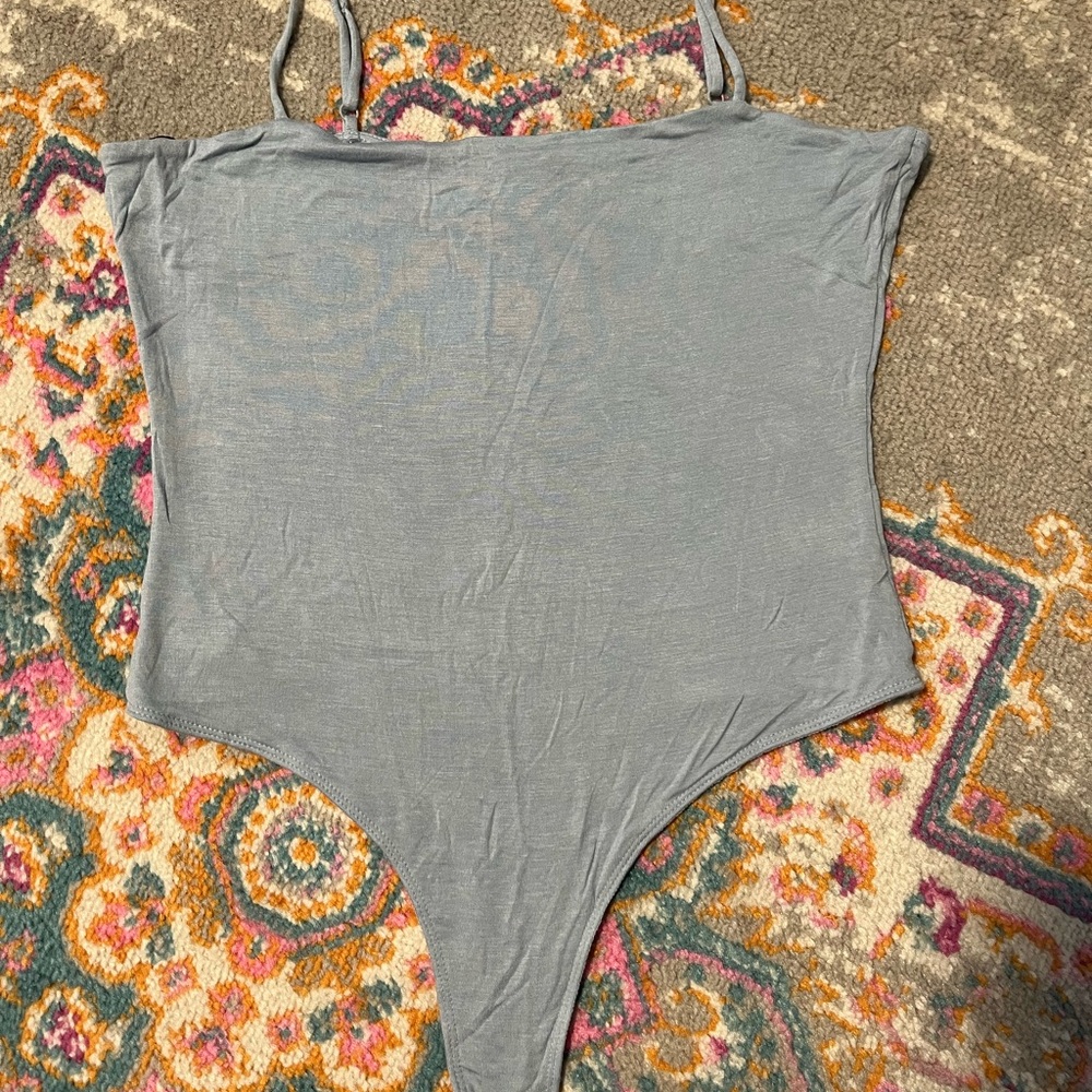 Double Zero Blue bodysuit
